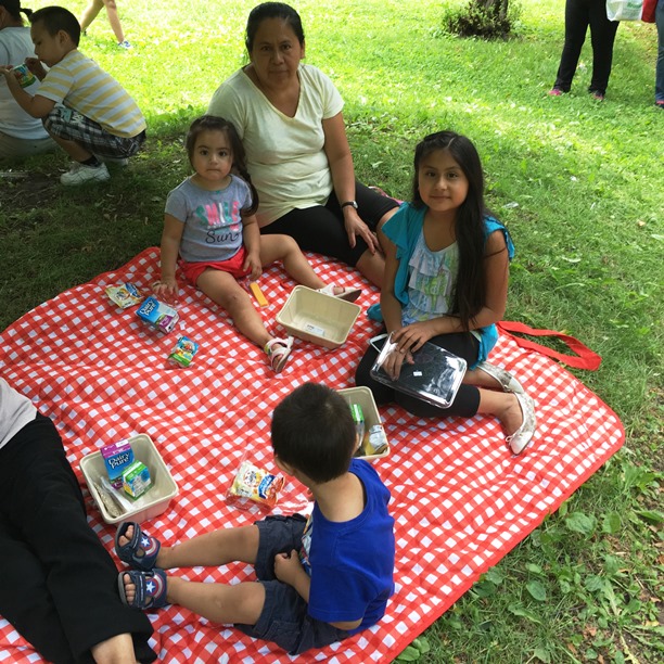 Children eat lunch outside the McKinley Library