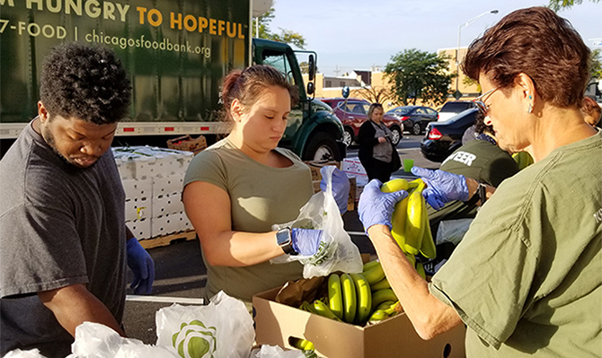 People pack bananas at a mobile food pantry program