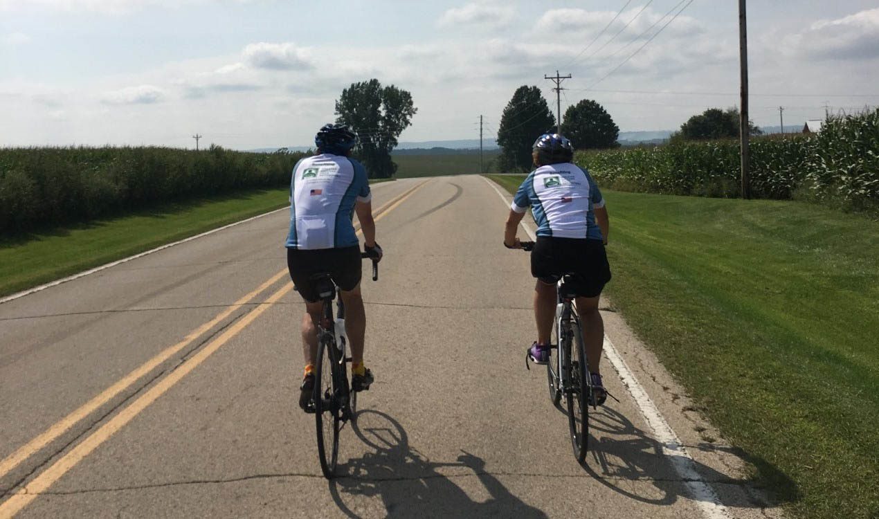 Steve Koch and Kate Maehr riding bikes