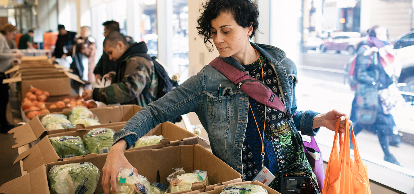 Students at Harold Washington College select fruits and vegetables from the Healthy Student Market