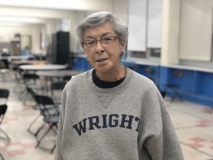 Angela Schreiner is a longtime volunteer at the food pantry who also attended the school in 1958 before the fire.