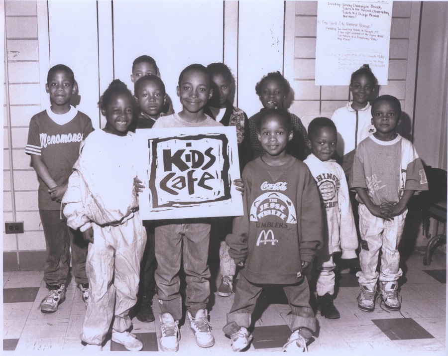 Children in the Food Depository's Kids Cafe program pose for a photo.