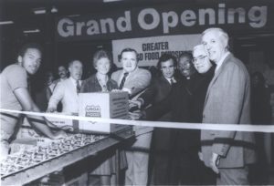 Food Depository and community leaders pose at a 1984 ribbon cutting at the 4501 South Tripp Avenue location.
