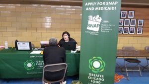 Food Depository staff connect veterans to SNAP benefits and Medicaid at the Standdown.