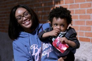 Devin Green and her son visit thef ood pantry.