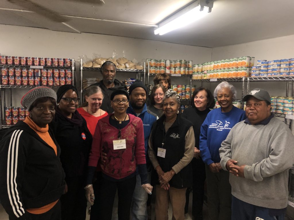 The volunteers of the Maple Morgan Park food pantry pose for a photo