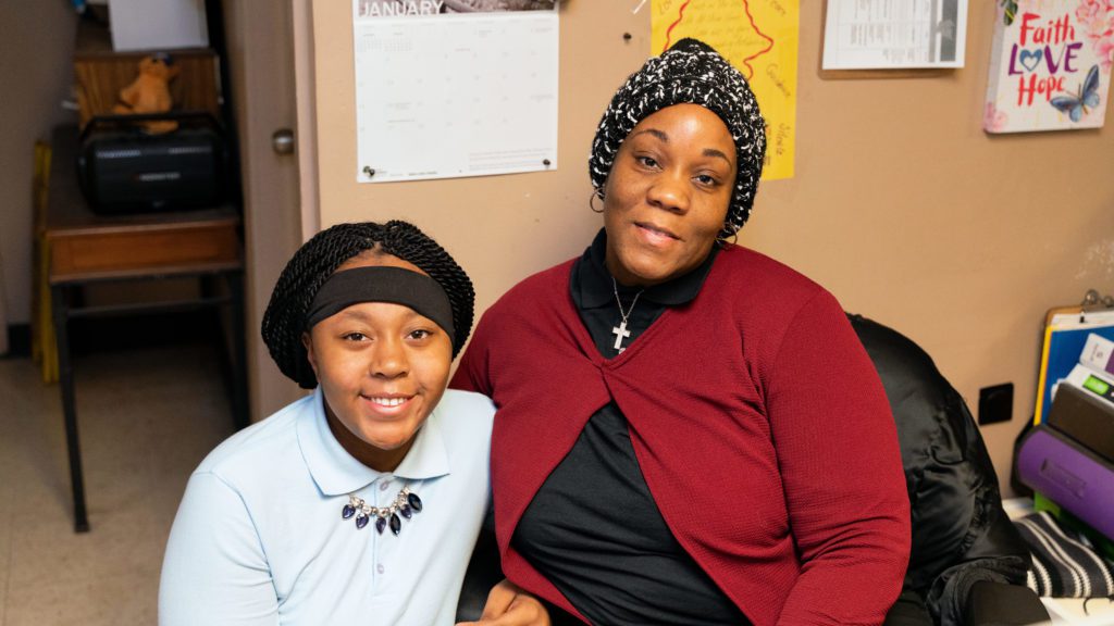 Ke'Meriell Hunter (left) poses with her mother Shaquita Wells