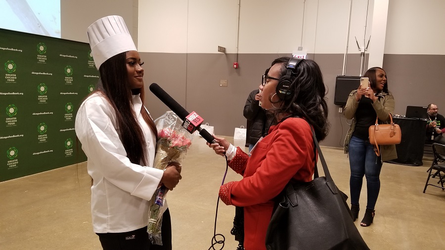 Sydni Romano, a Chicago’s Community Kitchens graduate, is interviewed by WBEZ reporter Natalie Moore.
