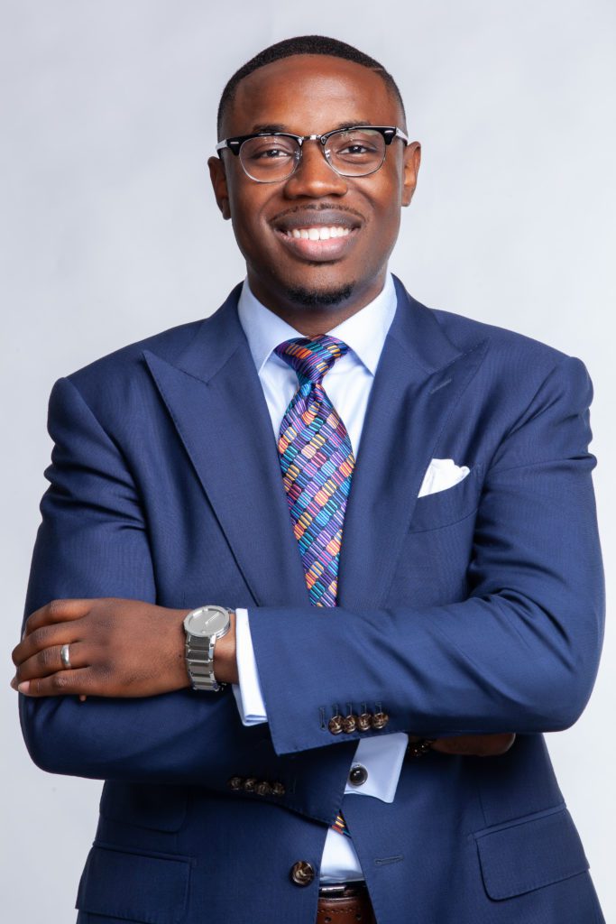 A headshot of Rev. Reginald Sharpe Jr.