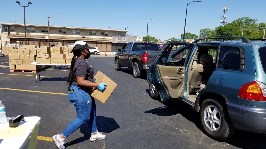 A volunteer helps a person in need in Roseland.
