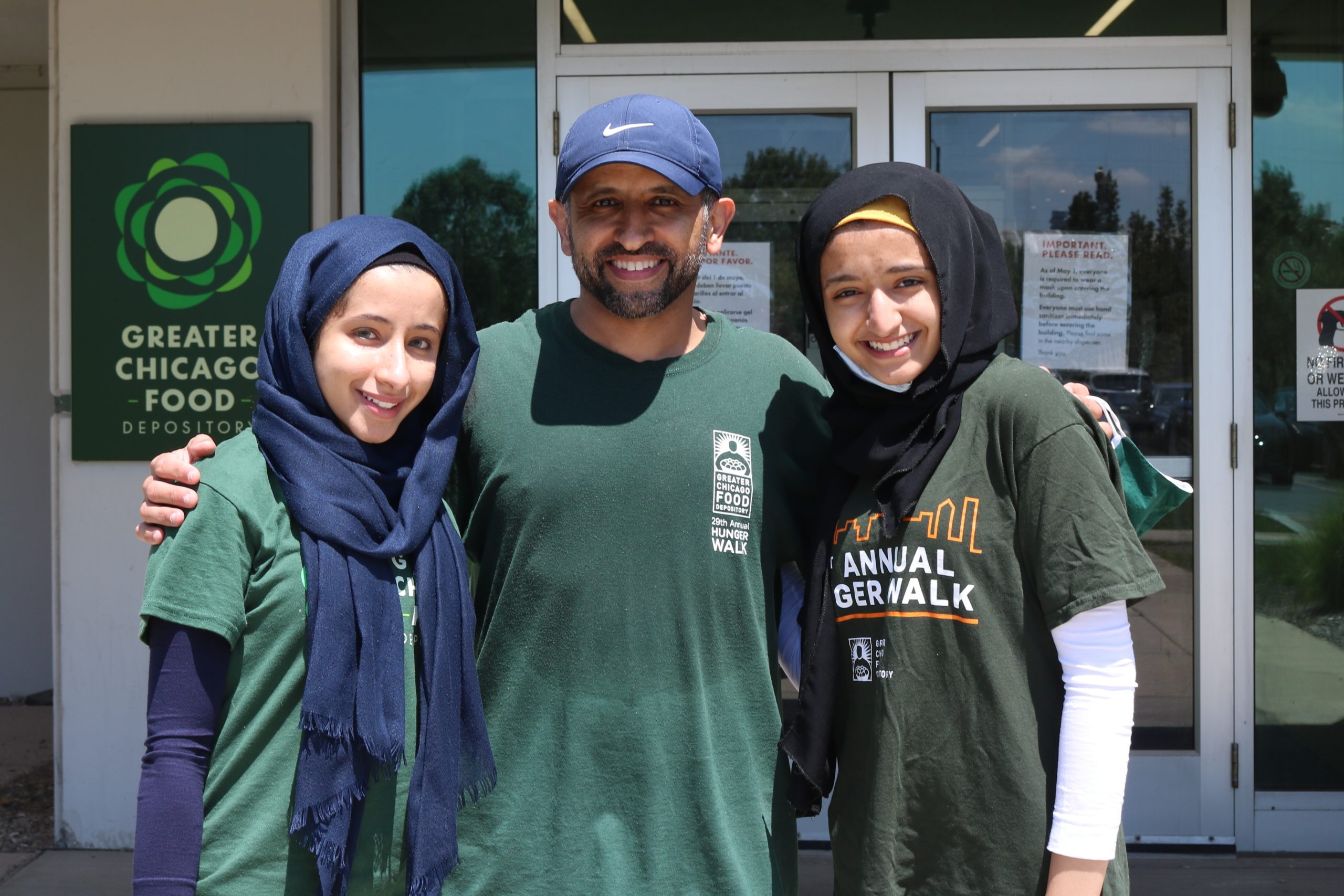 The Nasser family (from left: Mya, Naser, and Dana) at the Food Depository headquarters