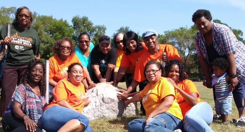 Vicky Jackson Bondurant (front, inner right) and the volunteers of the Hattie B. Williams food pantry at the Food Depository's annual Hunger Walk.