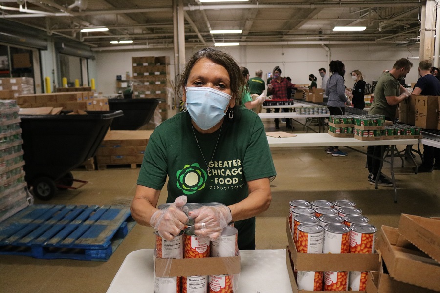 Rita Pineda, a retired Chicago Public Schools teacher, has logged nearly 100 hours of volunteering at the Food Depository during the pandemic.