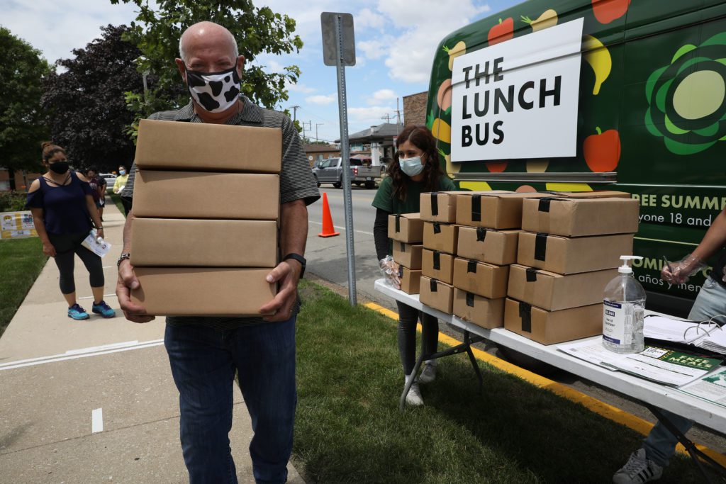 Larry Portnoff picks up meals from the Berwyn Lunch Bus