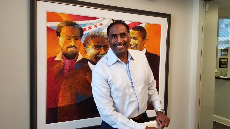 Leon Walker, a community developer and a Food Depository board member, stands for a portrait.