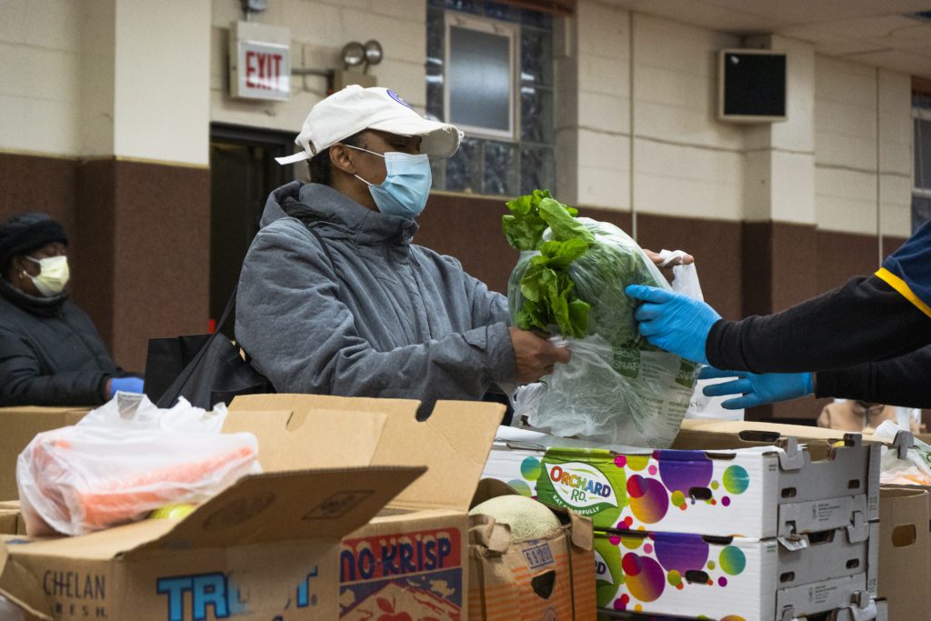 Curtissa Rodriguez picks out fresh groceries for her and her family.