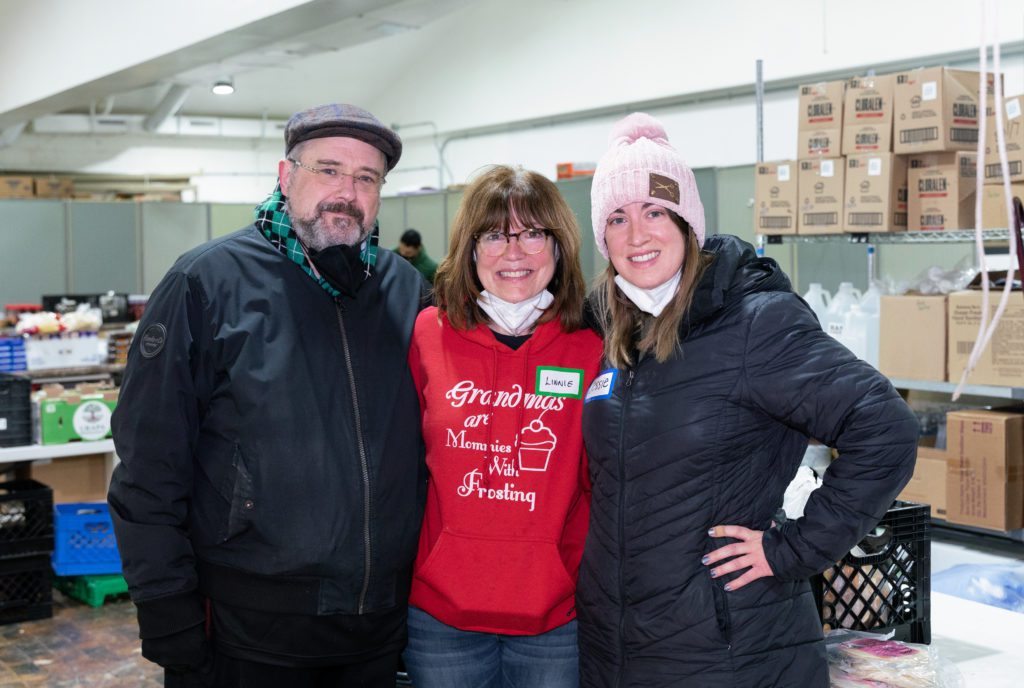 (From left) Pantry coordinators John and Linda Dumas, along with their daughter Jessie Mayer, who volunteers at the pantry.