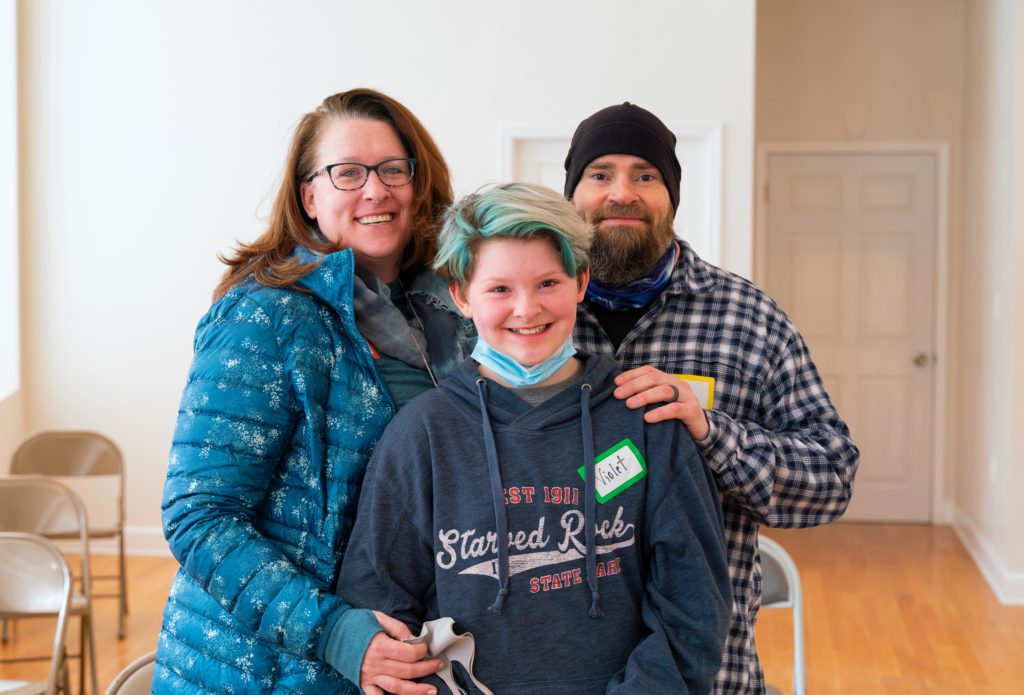 (From right) Meredith, Violet and Lee Walter at the Share Food Share Love food pantry