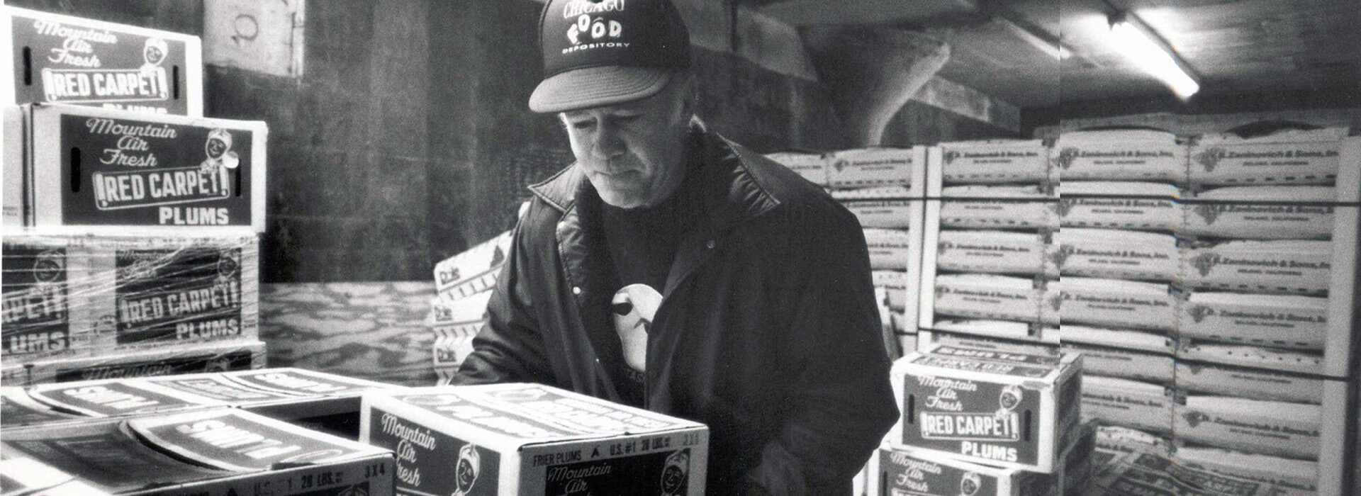 Historical image of man with food in truck