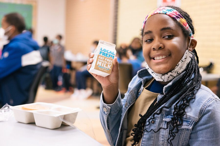 Girl with school meal