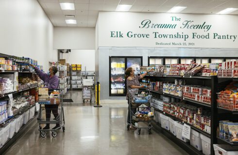 two women shop at a food pantry