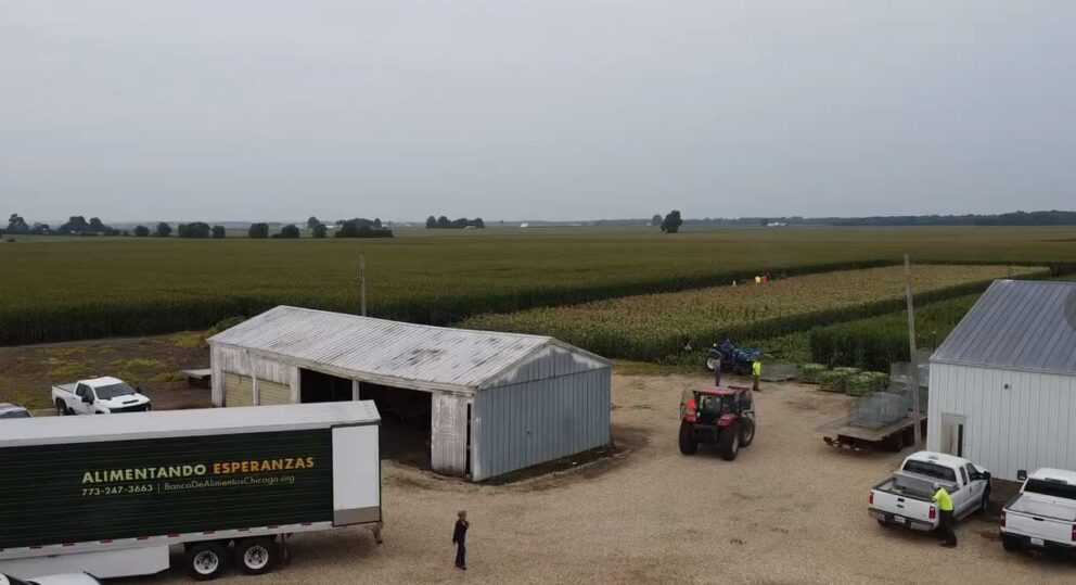 a semi truck is at a farm site