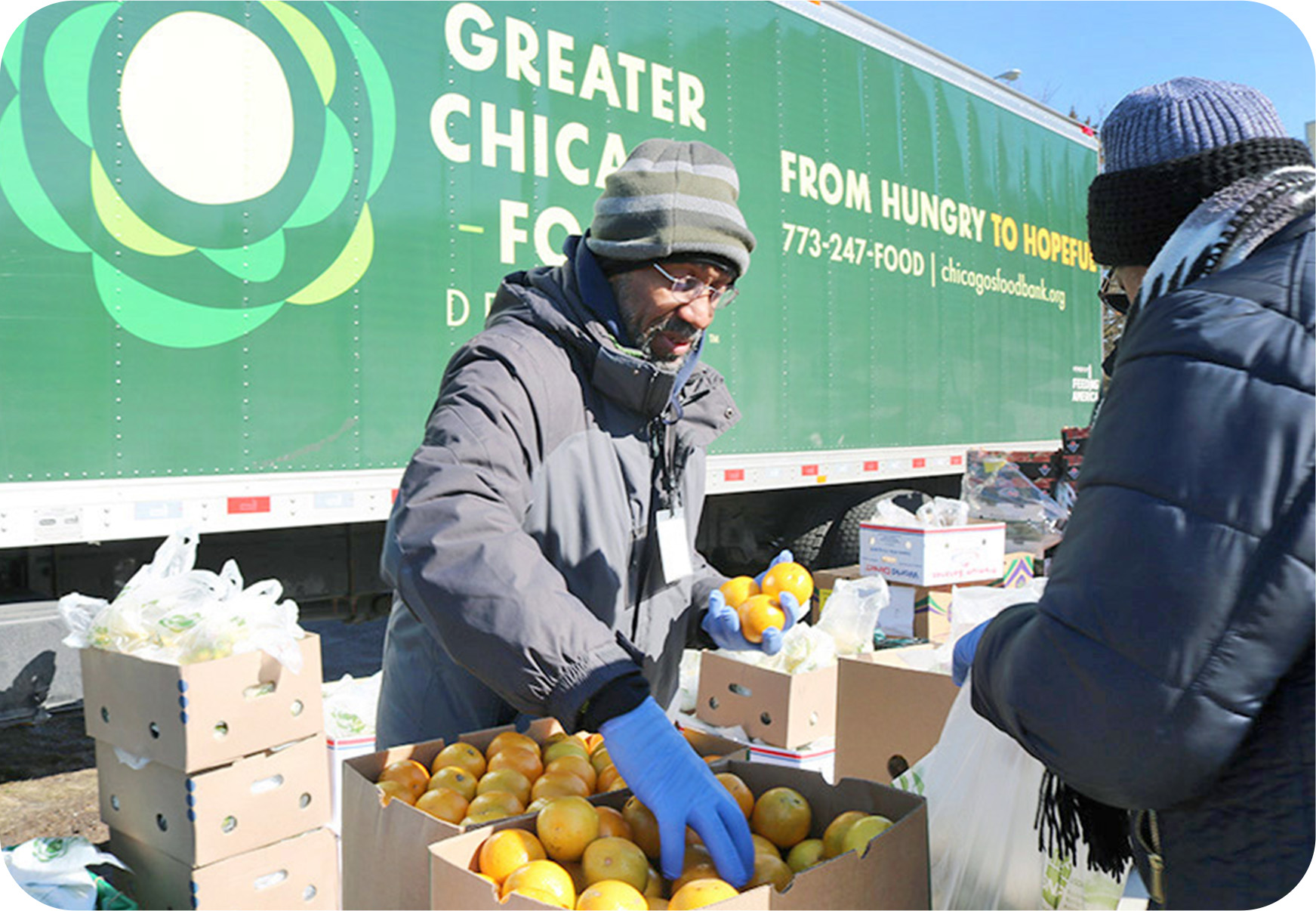 This is a volunteer helping at a local food pantry.