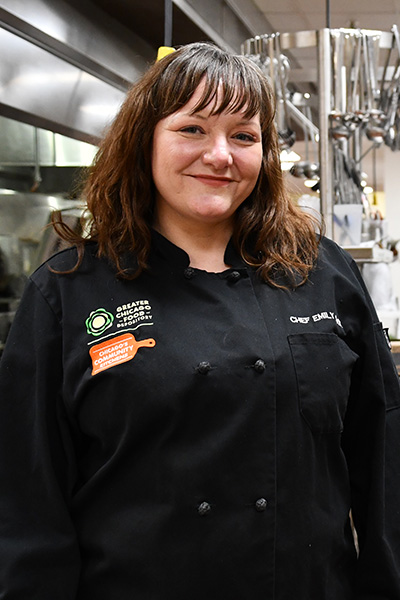 Emily Cook, food handler and production instructor at the Food Depository.