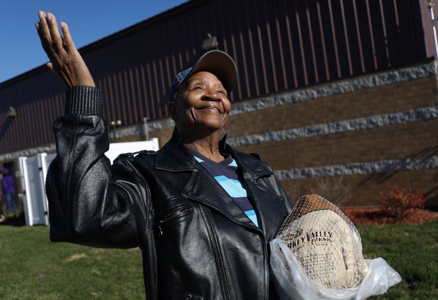 Hattie B. pantry guest, Betty Seaton, praises God for the food she received.