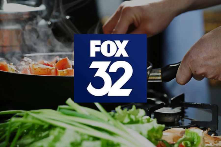Chef cooking with Fox 32 logo