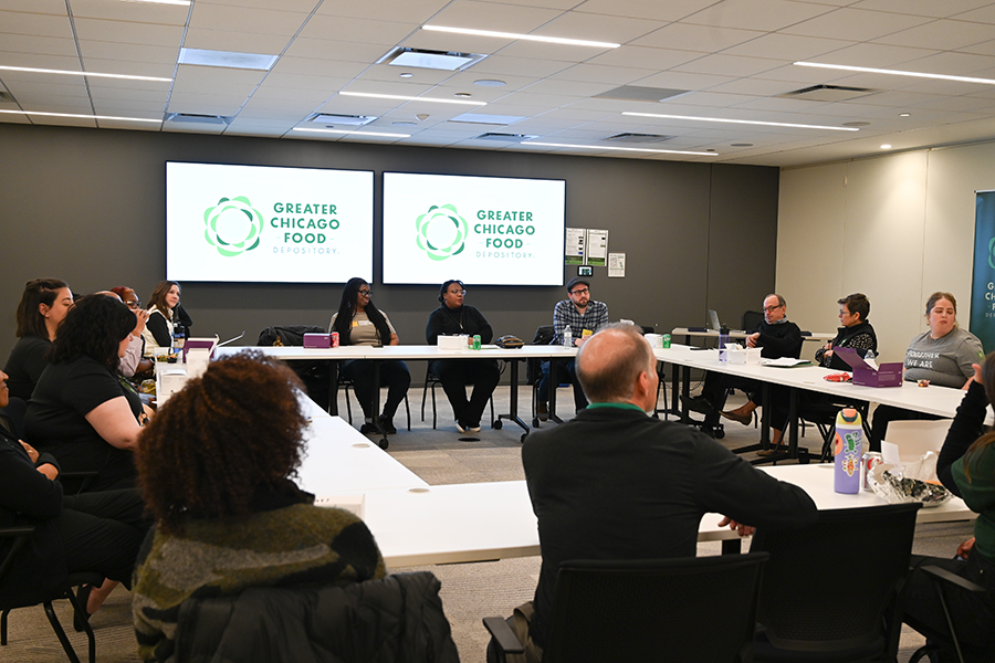 Three Food Equity Ambassadors share with a room full of people. 