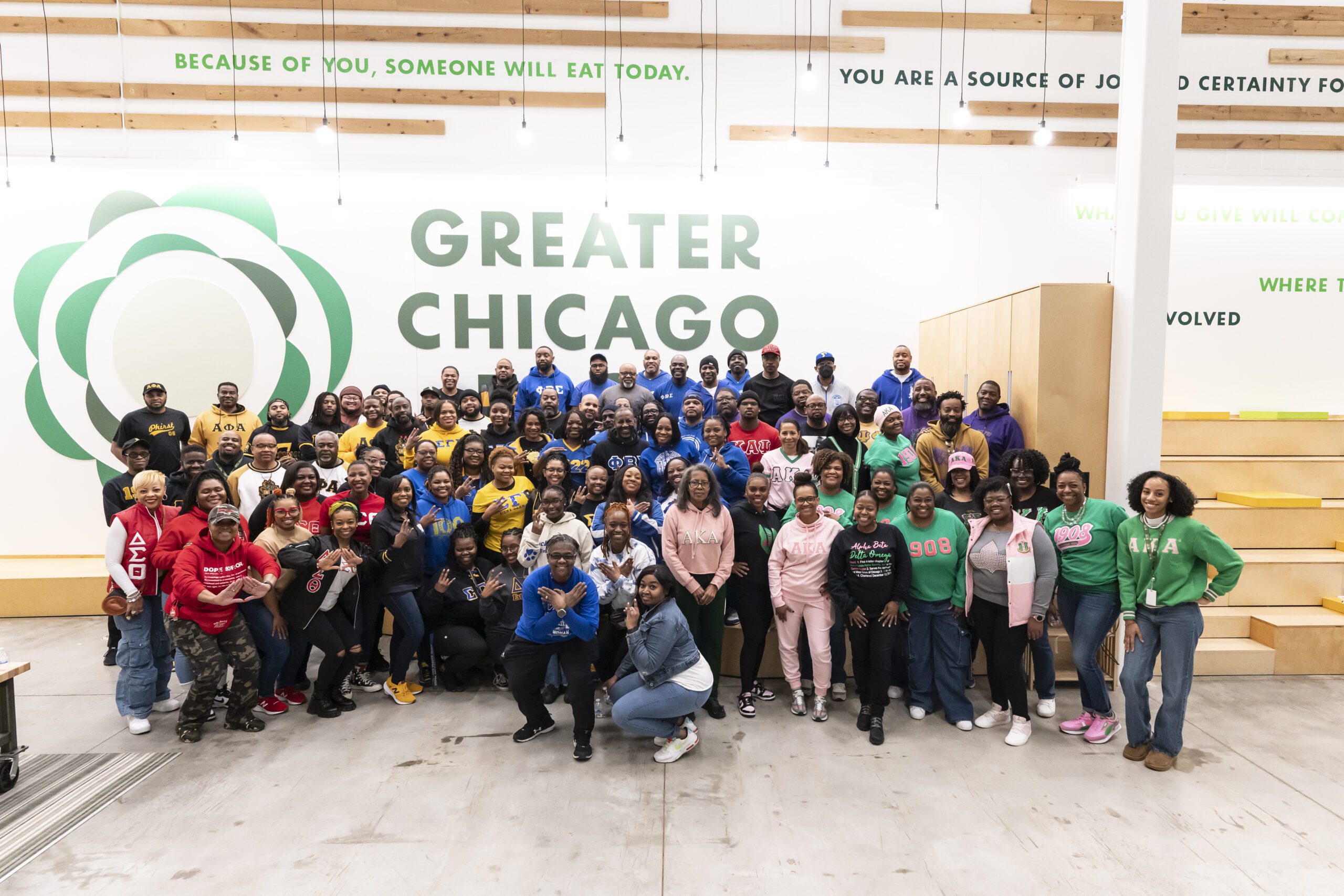 Members of the Divine Nine fraternities and sororities visit the Food Depository for the second Annual Divine Nine Repack