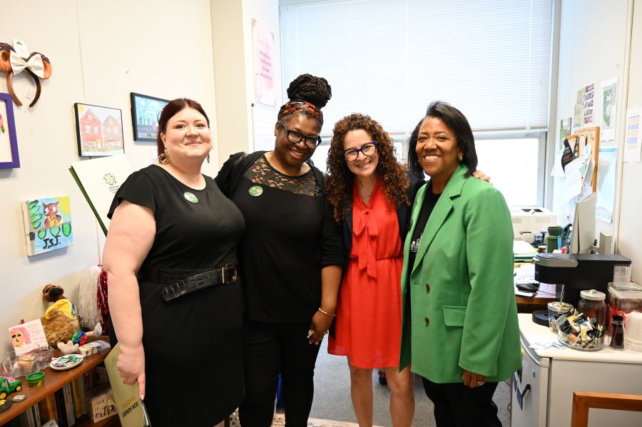 Four women in a room