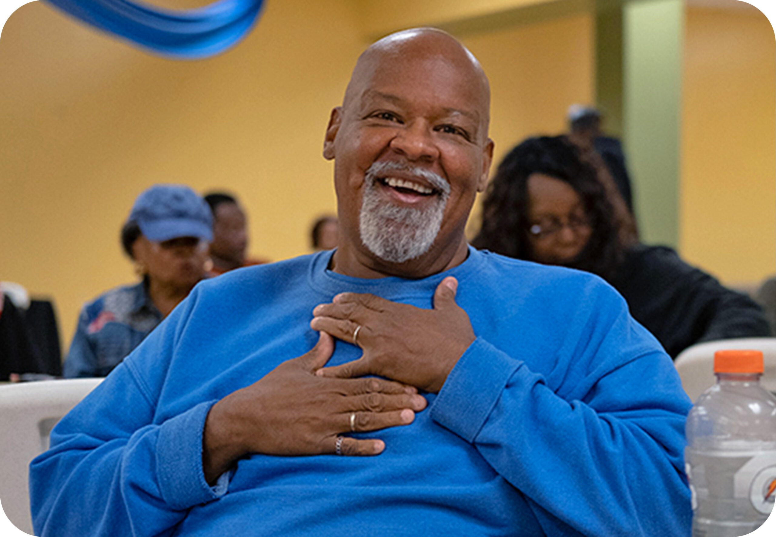 This is Dale wearing a blue shirt voluteering at the Greater Chicago Food Depository.