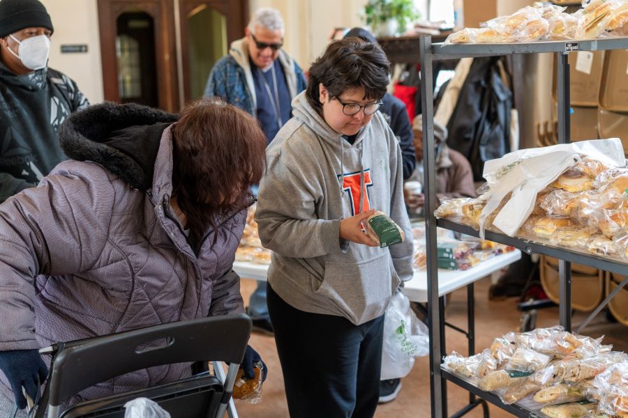 a guest shops at a food pantry